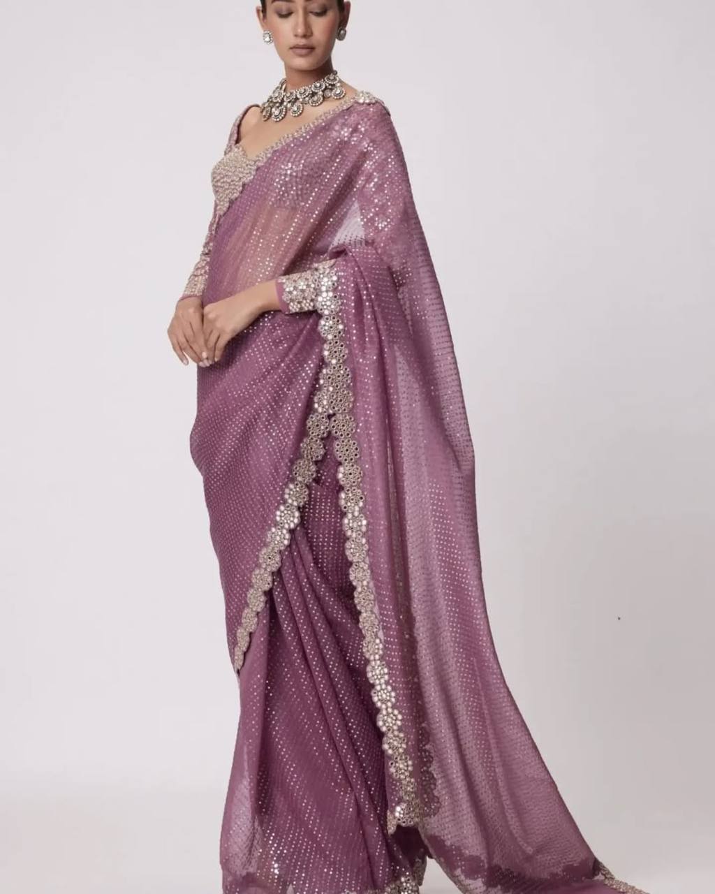 Faux Georgette Saree featuring a beautifully embroidered body adorned with sparkling 5mm sequins