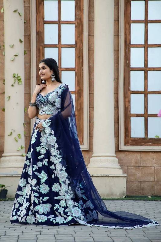 Faux Georgette Lehenga features intricate sequens embroidery