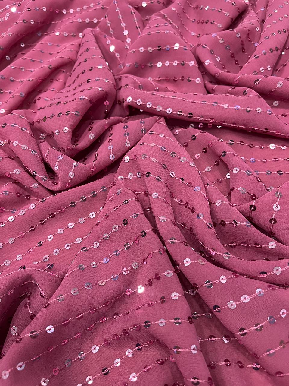 Faux Georgette Saree featuring a beautifully embroidered body adorned with sparkling 5mm sequins