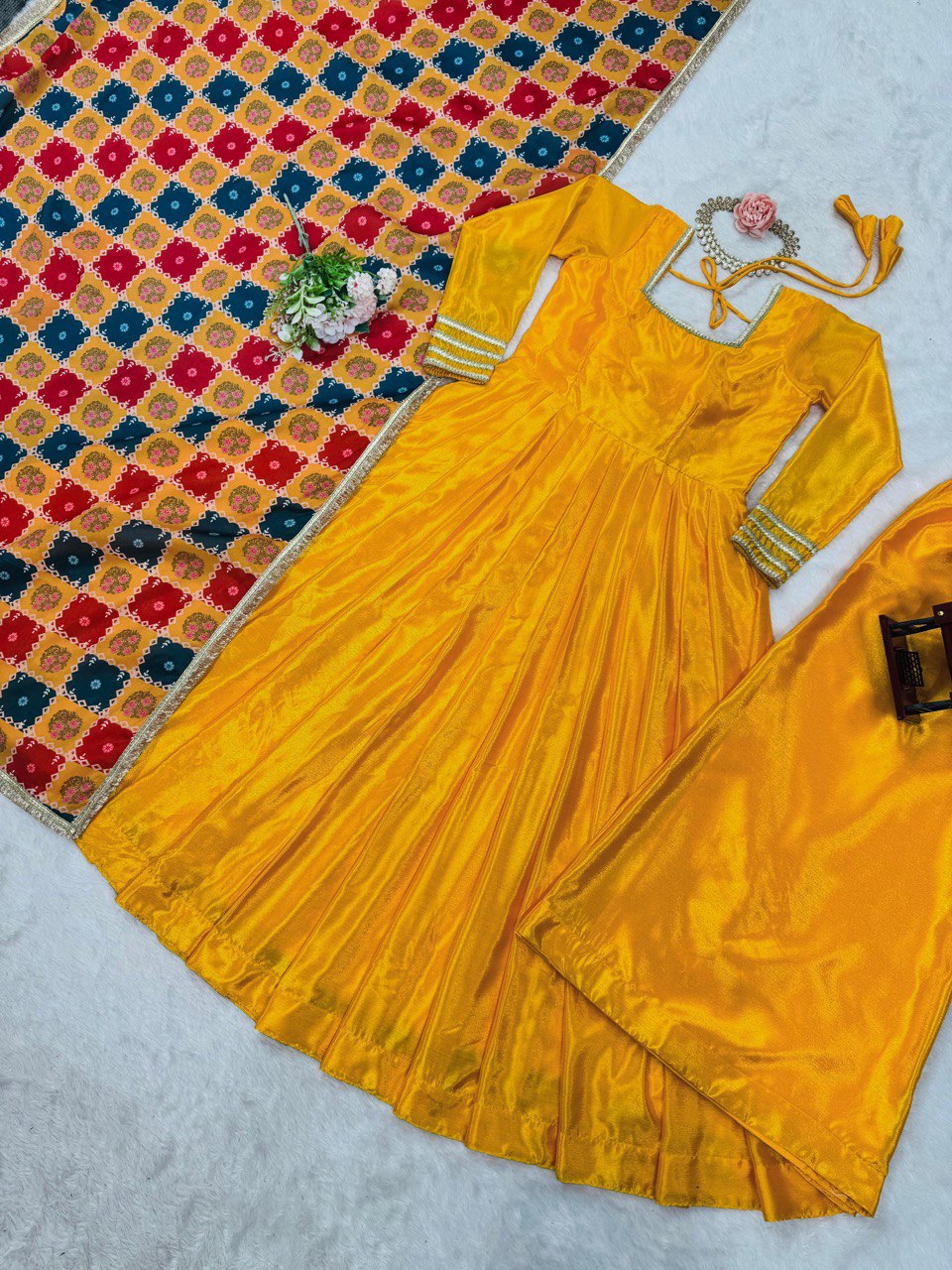  elegant three-piece ensemble featuring a Chinon silk top and palazzo pant with dupatta