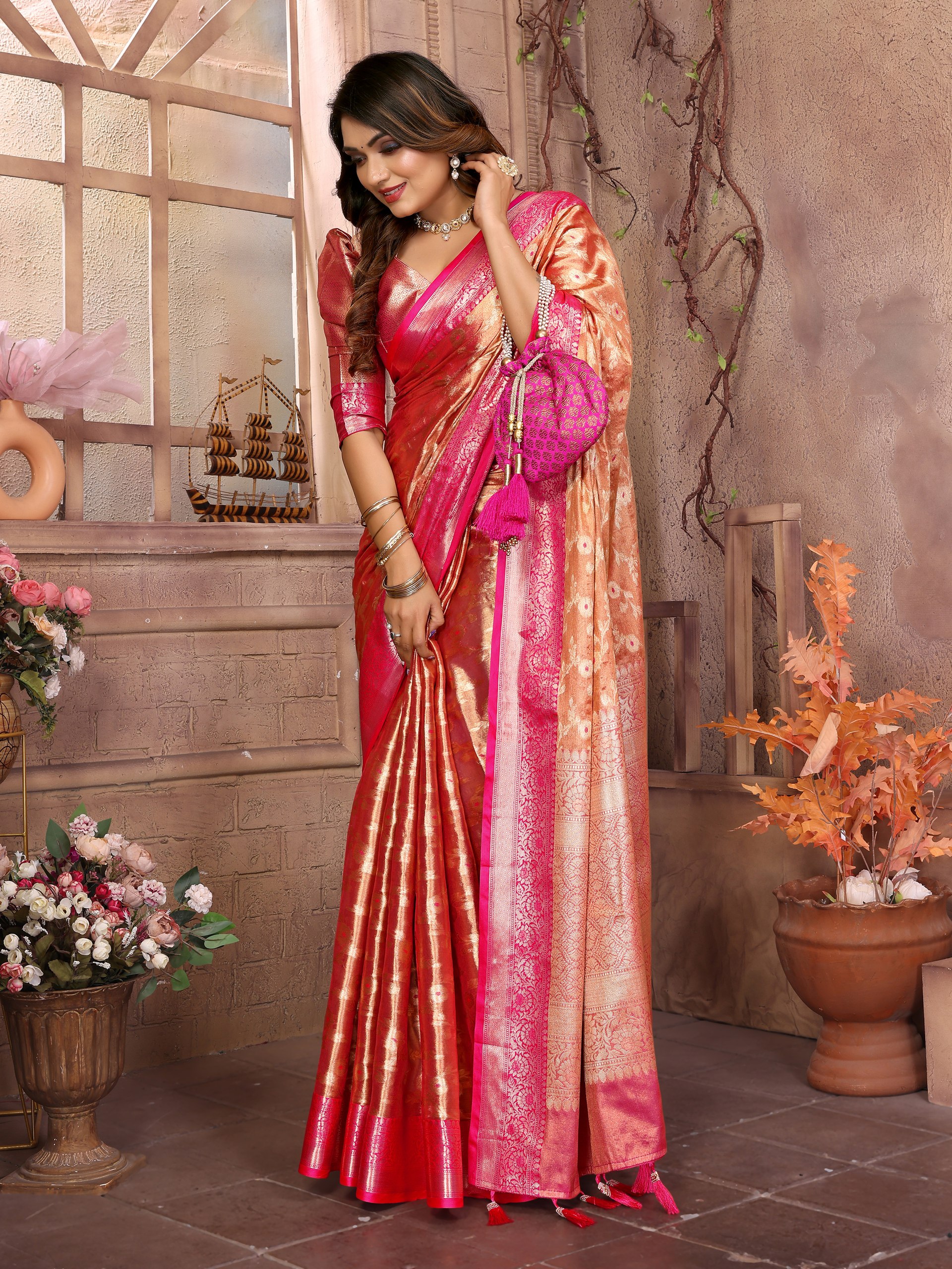 Handloom Tissue Silk Saree featuring intricate all-over Zari weaving designs